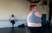 Carol Squires warming up before a rehearsal  session of the Phat Fly Girls, a hip hop performing ensemble featuring fat dancers. The  Phat Fly Girls shows are produced by Big Moves, the only service organization in the world dedicated to promoting size diversity in dance.