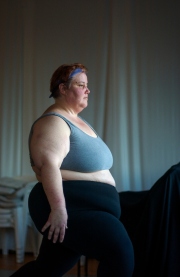 Carol Squires warming up before a rehearsal  session of the Phat Fly Girls, a hip hop performing ensemble featuring fat dancers. The  Phat Fly Girls shows are produced by Big Moves, the only service organization in the world dedicated to promoting size diversity in dance.
