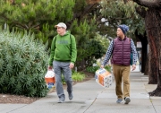 San Francisco residents returning from a convenience store with toilet paper in San Francisco, CA on Mach 18 , 2020. Toilet paper has been the main staple to fly off the shelves since the coronavirus crisis. 
Millions of San Francisco Bay Area  residents were ordered to stay home to slow the spread of the coronavirus as part of a lockdown effort, marking one of the nation's strongest efforts to stem the spread of the deadly virus.