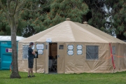 Sick people  at a first-of-its-kind COVID-19 testing center in Hayward, CA, on March 23, 2020.   
The free test facility opened to  to the public this morning regardless of where the patients live or their immigration status. 
The entire state of California is on a shelter-in-place status ordered by the governor to slow the spread of the COVID-19 disease.