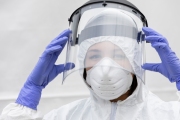 Cassandra Manuel, a nurse practitioner, working at a drive-thru coronavirus testing site for essential workers at the Henry J. Kaiser Convention Center in Oakland, CA, on April 6, 2020. The center opened today for direct service providers such as healthcare workers, grocery and food bank workers, homeless outreach workers, and others who work directly with the public.