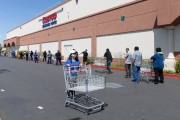 Shoppers at a local Costco store in Hayward, CA, on April 15, 2020. Long lines with a distance of 6 feet between each person is now the norm  to limit the spread of the coronavirus SARS-CoV-2.