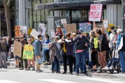 Demonstrators gather outside the Tesla dealership in San Francisco, CA, on March 29, 2025, as part of the global "Tesla Takedown" protests. These protests, spanning over 200 locations worldwide, were organized to oppose Elon Musk's involvement with the U.S. federal government and the associated budget cuts and layoffs. The protesters held signs and chanted slogans to express their discontent with Musk's actions. The movement encourages individuals to boycott Tesla products and divest from Tesla stock, aiming to impact the company's financial standing as a form of protest.