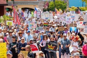 Protesters in downtown San Rafael, CA, on June 14, 2025, rallied under the banner of the “No Kings” protest, voicing opposition to President Donald Trump and what they view as authoritarian tendencies in American politics. Demonstrators carried signs and delivered speeches calling for the defense of democratic institutions and the rejection of political figures perceived as undermining them.