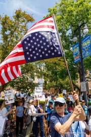 Protesters in downtown San Rafael, CA, on June 14, 2025, rallied under the banner of the “No Kings” protest, voicing opposition to President Donald Trump and what they view as authoritarian tendencies in American politics. Demonstrators carried signs and delivered speeches calling for the defense of democratic institutions and the rejection of political figures perceived as undermining them.