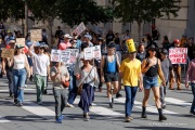 Tens of thousands marched through the streets of San Francisco, CA, on October 18, 2025, during a “No Kings” protest, one of more than 2,700 rallies nationwide opposing what organizers call President Donald Trump’s “authoritarian” agenda.