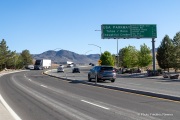 Signs at the entrance to the Tahoe Reno Industrial Center (TRIC), one of the largest industrial parks in the world, in Sparks, NV. TRIC has become one of the densest concentrations of hyperscale data center infrastructure in the western United States. Its growth has been driven by favorable power costs, fast network connectivity to the Bay Area, and Nevada’s business friendly tax environment.