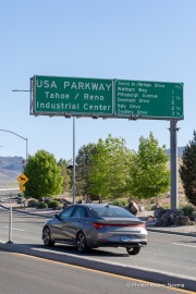 Signs at the entrance to the Tahoe Reno Industrial Center (TRIC), one of the largest industrial parks in the world, in Sparks, NV. TRIC has become one of the densest concentrations of hyperscale data center infrastructure in the western United States. Its growth has been driven by favorable power costs, fast network connectivity to the Bay Area, and Nevada’s business friendly tax environment.