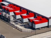 The cooling system of the Switch data center campus at the Tahoe Reno Industrial Center (TRIC), east of Sparks, NV. Swtich is one of the largest data center developments in the world and a defining symbol of the hyperscale infrastructure transforming northern Nevada into a major technology hub. Known for its massive, highly secure facilities, Switch built the campus to support cloud computing, enterprise data storage, and artificial intelligence workloads for large corporate clients. The company was drawn to TRIC by Nevada’s favorable tax structure, available land, access to renewable energy, and fast fiber connections to the Bay Area. The campus also uses an advanced cooling system designed for the desert climate, relying heavily on outside air and evaporative cooling technologies to reduce energy consumption while maintaining stable temperatures for thousands of servers operating around the clock. Surrounded by desert landscapes and heavy industrial development, the sprawling campus reflects the enormous physical footprint and energy demands of the digital economy powering modern internet and AI services.