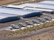 The cooling system at the Apple Reno Data Center near Sparks, in the Tahoe Reno Industrial Center (TRIC) east of Sparks, NV.  
Apple operates one of its major data center campuses there. Opened in 2012, the facility supports services such as iCloud and other online infrastructure. The site was strategically chosen for Nevada’s dry climate, which allows the servers to be cooled efficiently using outside air for much of the year. Apple has also invested heavily in renewable energy projects in the region, including large solar installations that help power the campus. 
TRIC has become an important part of Northern Nevada’s growing role as a major technology and AI infrastructure hub in the western United States.