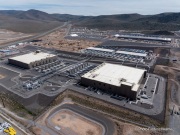 The Google data center campus at the Tahoe Reno Industrial Center (TRIC) east of Sparks, NV. It  is part of the massive expansion of hyperscale cloud infrastructure transforming northern Nevada into a major digital hub. Located east of Reno and Sparks along USA Parkway, the facility supports Google’s growing demand for cloud computing, AI processing, and data storage services. The region’s combination of abundant land, relatively low energy costs, tax incentives, and fast network connectivity to the Bay Area has attracted some of the world’s largest technology companies. Google’s presence at TRIC reflects the increasing concentration of large scale data infrastructure in Nevada, where warehouse sized server buildings, substations, and power generation facilities are reshaping the desert landscape to support the global digital economy.
