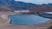 The Vantage Data Centers campus in the Tahoe Reno Industrial Center (TRIC) east of Sparks, NV, is part of the rapidly expanding hyperscale infrastructure landscape in northern Nevada, supporting large scale cloud computing and AI workloads. Like many facilities in the region, it relies on highly engineered cooling systems designed for the desert environment, combining efficient air handling with evaporative processes where water plays a measurable role in thermal management. Nearby, retention ponds and engineered water basins associated with industrial and infrastructure development in the area also reflect how water is stored, managed, and reused across large scale facilities in TRIC. The campus benefits from Nevada’s low power costs, abundant land, and strong fiber connectivity to West Coast markets, positioning it as a key node in the growing ecosystem of hyperscale data centers around Reno and Sparks.
