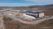 The Vantage Data Centers campus in the Tahoe Reno Industrial Center (TRIC) east of Sparks, NV, is part of the rapidly expanding hyperscale infrastructure landscape in northern Nevada, supporting large scale cloud computing and AI workloads. Like many facilities in the region, it relies on highly engineered cooling systems designed for the desert environment, combining efficient air handling with evaporative processes where water plays a measurable role in thermal management. Nearby, retention ponds and engineered water basins associated with industrial and infrastructure development in the area also reflect how water is stored, managed, and reused across large scale facilities in TRIC. The campus benefits from Nevada’s low power costs, abundant land, and strong fiber connectivity to West Coast markets, positioning it as a key node in the growing ecosystem of hyperscale data centers around Reno and Sparks.