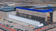 The cooling system of the Vantage Data Centers campus in the Tahoe Reno Industrial Center (TRIC) east of Sparks, NV. The campus is part of the rapidly expanding hyperscale infrastructure landscape in northern Nevada, supporting large scale cloud computing and AI workloads. Like many facilities in the region, it relies on highly engineered cooling systems designed for the desert environment, combining efficient air handling with evaporative processes where water plays a measurable role in thermal management. Nearby, retention ponds and engineered water basins associated with industrial and infrastructure development in the area also reflect how water is stored, managed, and reused across large scale facilities in TRIC. The campus benefits from Nevada’s low power costs, abundant land, and strong fiber connectivity to West Coast markets, positioning it as a key node in the growing ecosystem of hyperscale data centers around Reno and Sparks.