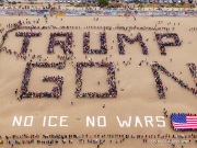 Volunteers form a human banner on a beach in San Francisco on March 27, 2026. The “No Kings” protests drew thousands of people across the city as part of a nationwide day of action opposing President Donald Trump’s administration. The rallies were among thousands held across the United States, with demonstrators raising concerns about what they describe as threats to free speech, voting rights, and the war in Iran.