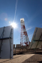 The solar tower and heliostats.The 29 megawatt-thermal ÒSolar-to-SteamÓ facility, powered by BrightSourceÕs proprietary LPT solar thermal technology, uses the sun to create high-temperature and pressure steam for EOR. The 100-acre facility consists of 3,822 heliostats, each consisting of two 10x7-foot mirrors mounted to a six-foot steel pole. The mirrors are focused on a boiler atop a 327-foot tall solar tower.