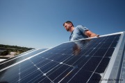 Installation of solar panels on top of Morrissey Engineering’s headquarters in Omaha.