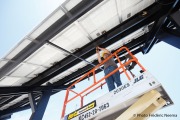 Installing solar panels in the parking lot of Creighton University in Omaha