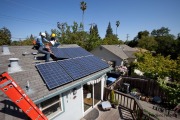 Installation of a solar photovoltaic  system on top of a private house in Palo Alto, CA, on May 3, 2011,  by the volunteers of the non-profit organisation, SunWork Renewable Energy Projects.Specifications of the System:1.880 kW dc-stcREC Solar REC-235-PE BLK  (8)Enphase M190-72-240-S12  (8)Unirac SolarMount Light Rail with EcoFasten Solar Quik-Foot Brackets